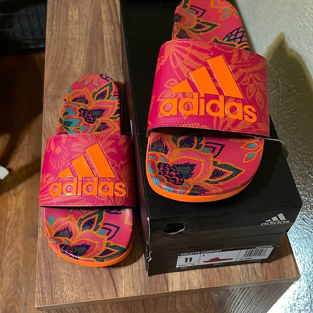 NWT. Adidas slides. Pink and orange floral print. Size 11 womens/ 9.5 mens